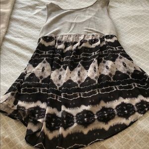 Gray tank with black and white underlay